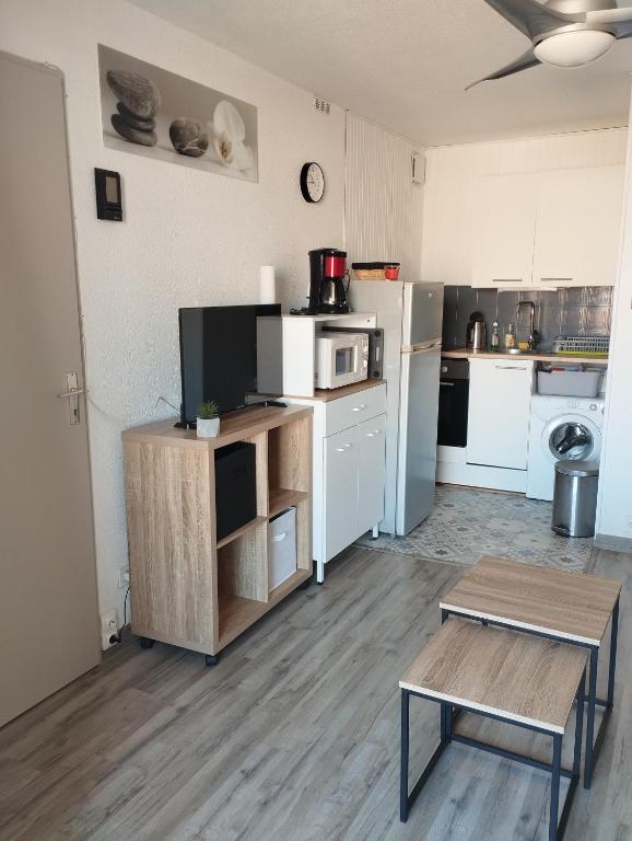 Kuchyňa alebo kuchynka v ubytovaní Appartement vue mer Le Barcarès