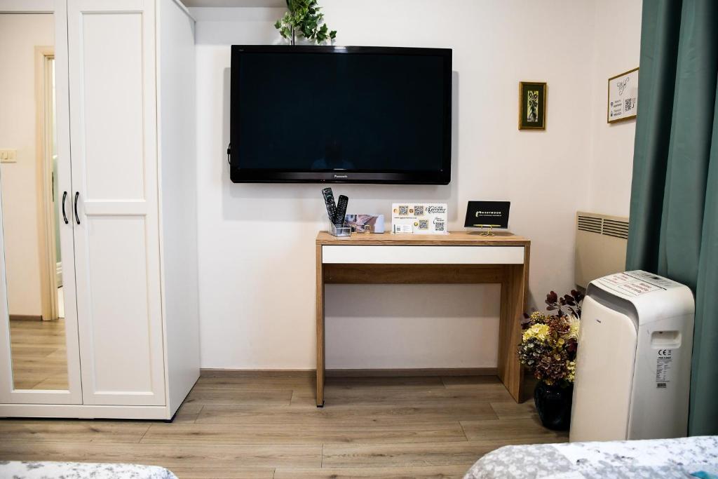 Televízia a/alebo spoločenská miestnosť v ubytovaní Apartments Experience Zagreb