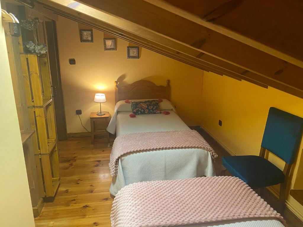 Ένα ή περισσότερα κρεβάτια σε δωμάτιο στο Casa Rural El Salvijo