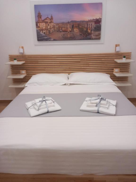 Postel nebo postele na pokoji v ubytování B&B Central Station