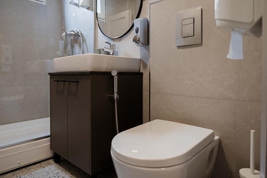 Koupelna v ubytování REAL Suites