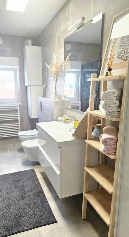 Kúpeľňa v ubytovaní Eximius Apartment