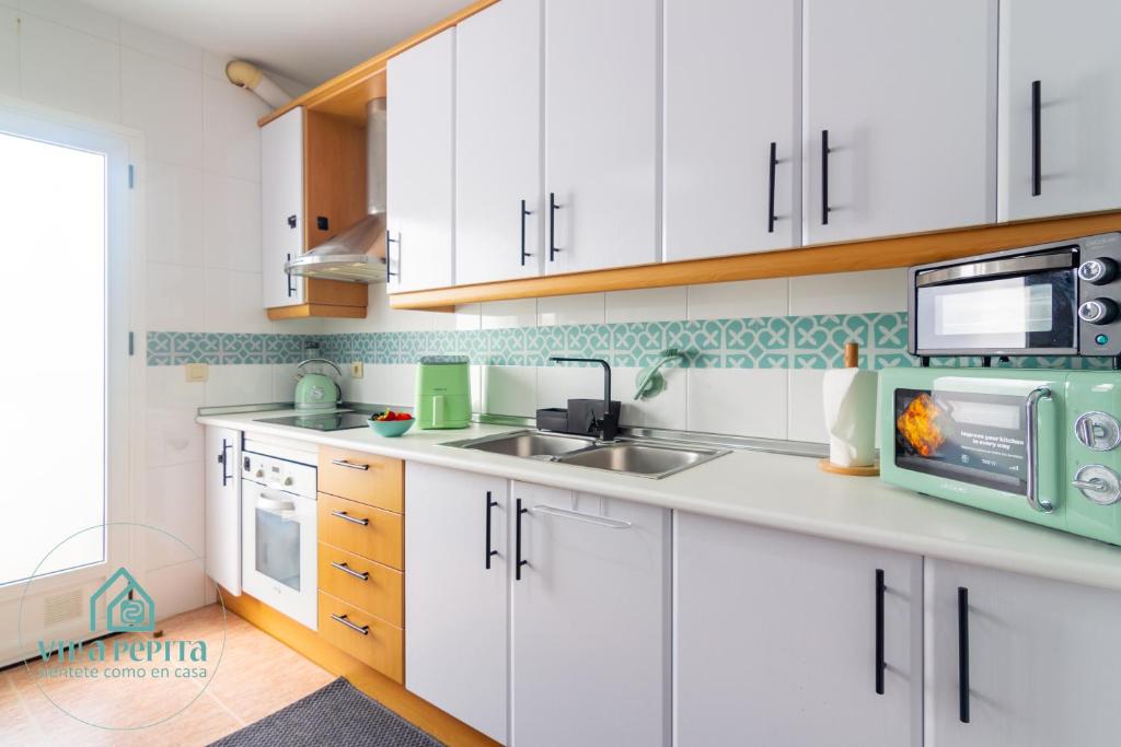 Kuchyň nebo kuchyňský kout v ubytování Villa Pepita