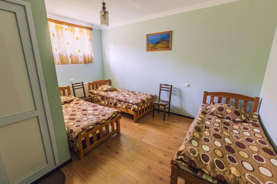 Postel nebo postele na pokoji v ubytování Hotel Nini
