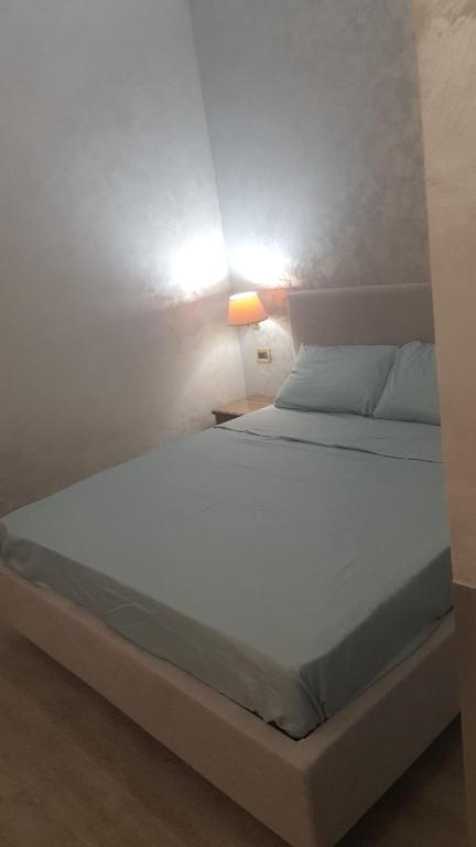 Postel nebo postele na pokoji v ubytování Sandel Giubileo Hotel