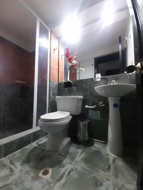 Koupelna v ubytování Hotel MACA lago calima