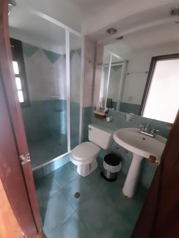 Koupelna v ubytování Hotel MACA lago calima