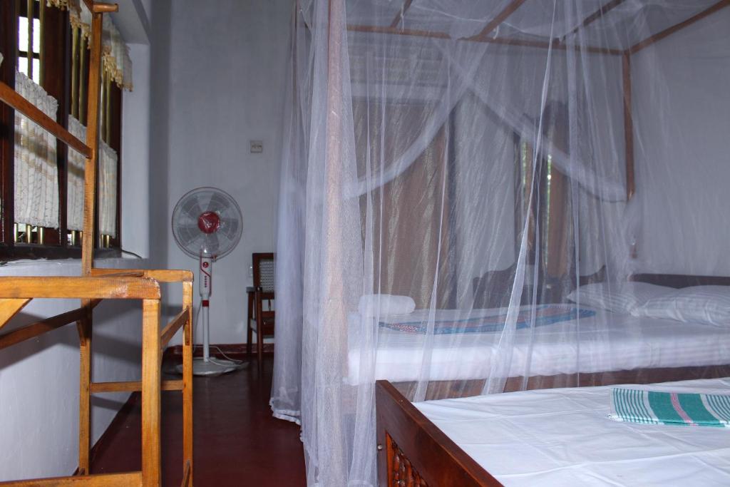 Postel nebo postele na pokoji v ubytování Abberny villa