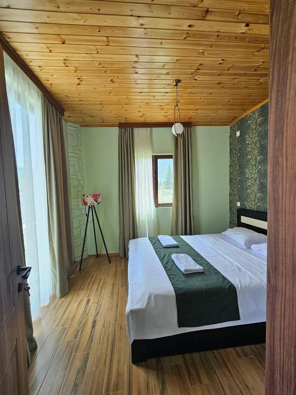 Postel nebo postele na pokoji v ubytování WoodStar