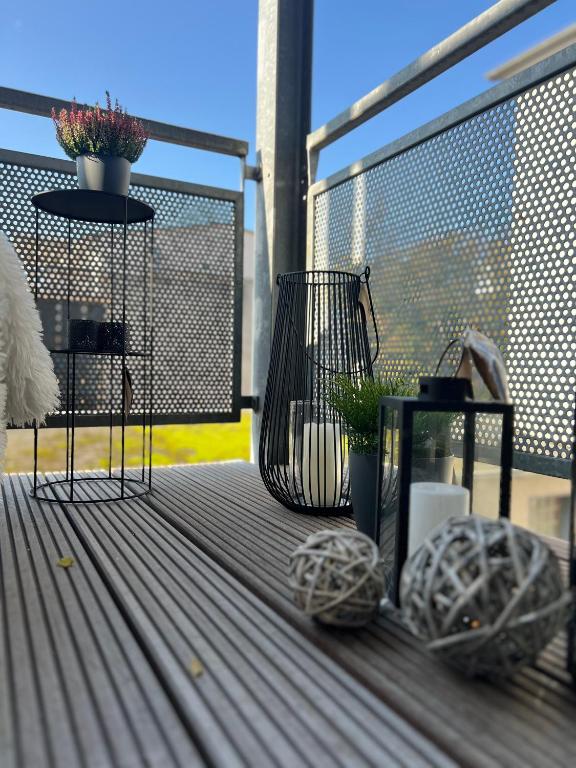 Ein Balkon oder eine Terrasse in der Unterkunft ZUHAUSE AM MEER mit Sonnenbalkon in Strand- und Altstadtnähe