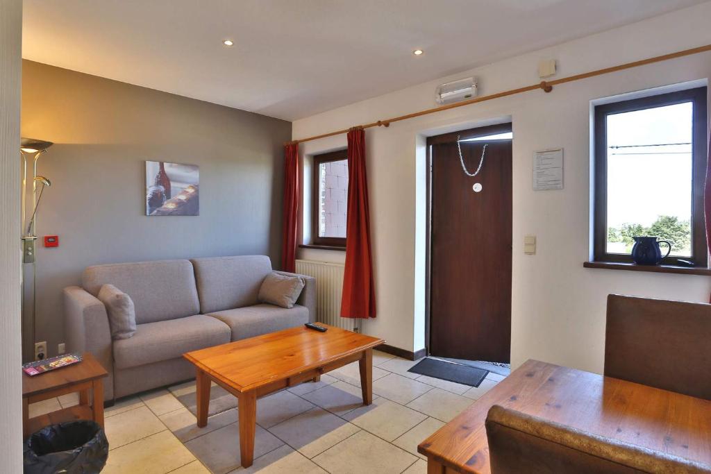 Posezení v ubytování Hotel-Restaurant La Crémaillère