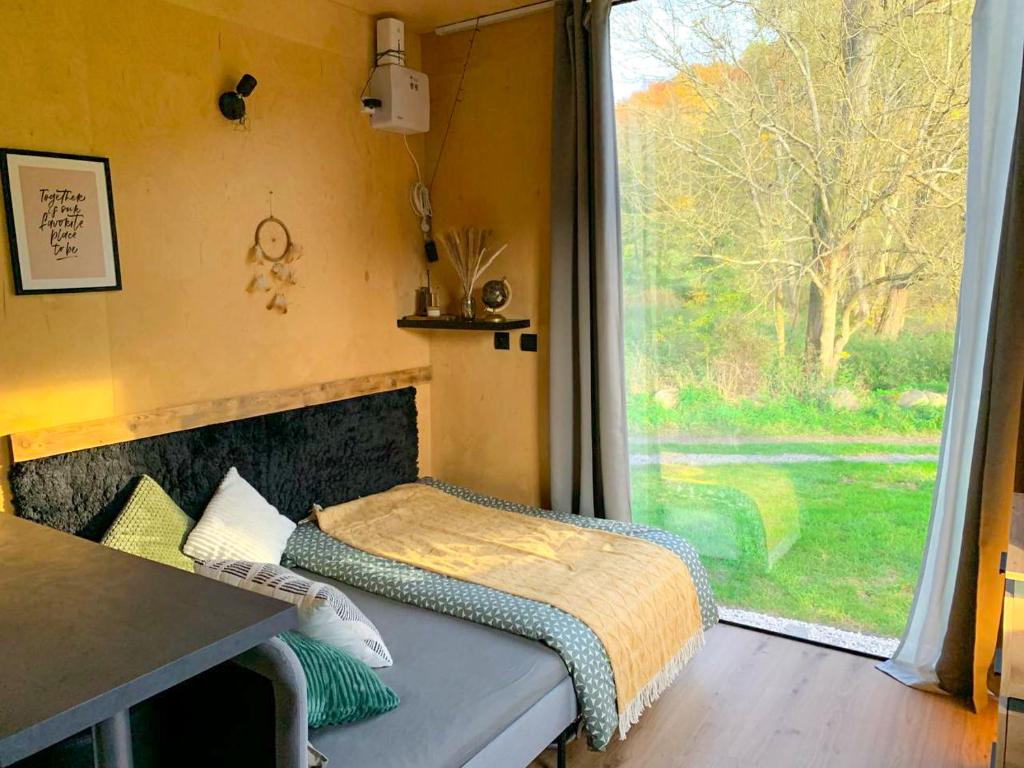 Postel nebo postele na pokoji v ubytování Bouda Krušnohorka