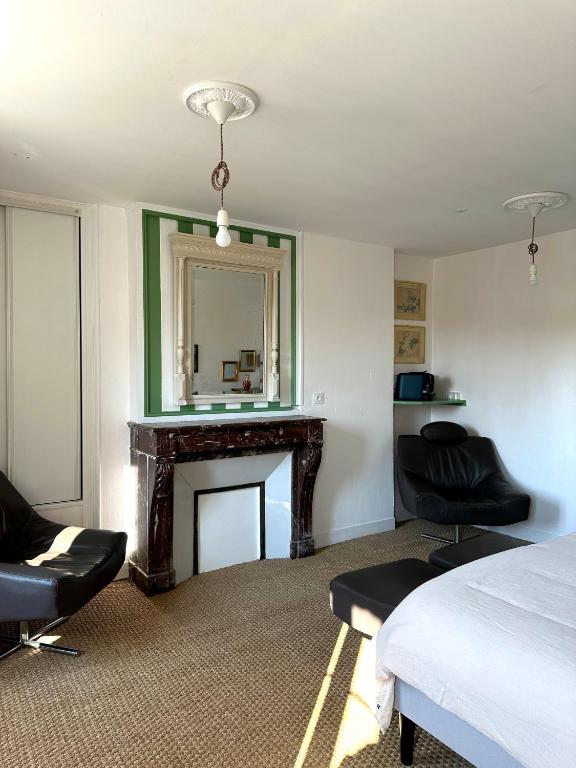 Posezení v ubytování Chambre d'hôtes de charme Partager Enregistrer