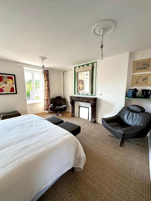 Postel nebo postele na pokoji v ubytování Chambre d'hôtes de charme Partager Enregistrer