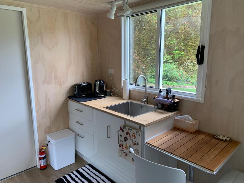 Köök või kööginurk majutusasutuses Herbert Hampden Cottage