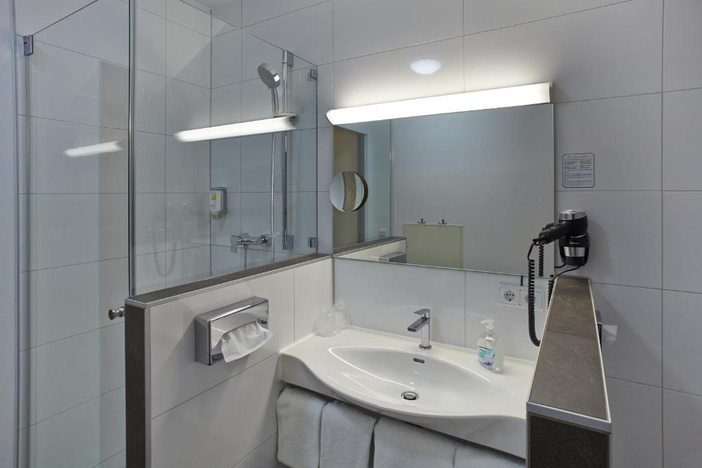 Koupelna v ubytování Hotel Sauerlacher Post