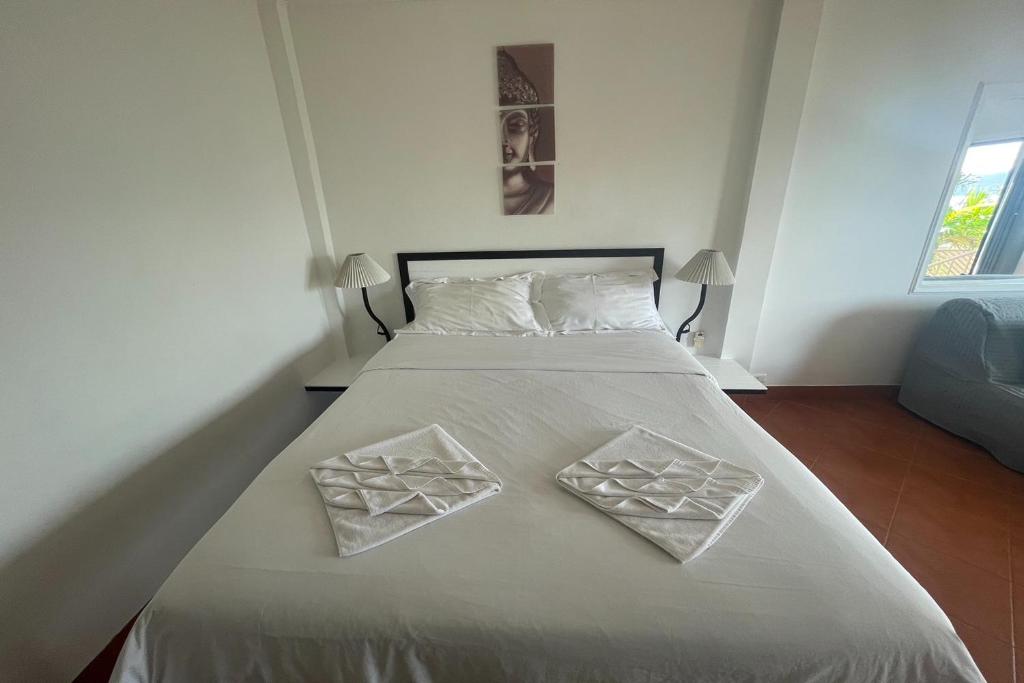 Postel nebo postele na pokoji v ubytování Swiss Villas Panoramic - SHA Certified