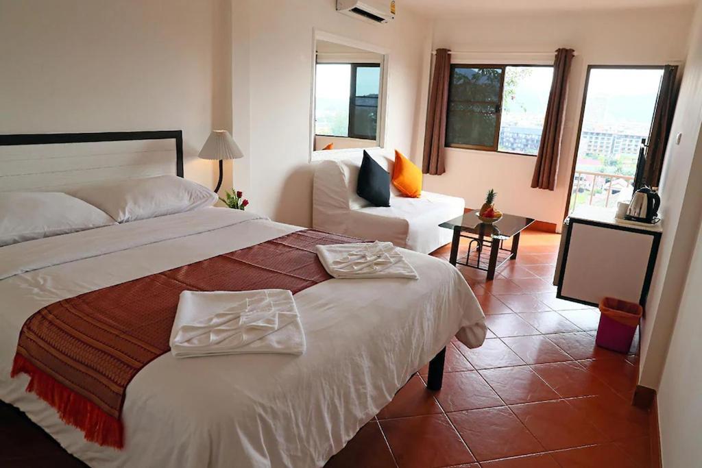 Postel nebo postele na pokoji v ubytování Swiss Villas Panoramic - SHA Certified