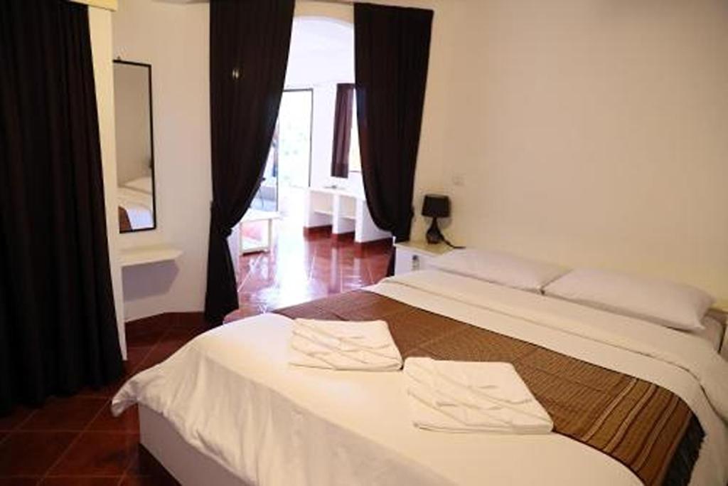 Postel nebo postele na pokoji v ubytování Swiss Villas Panoramic - SHA Certified