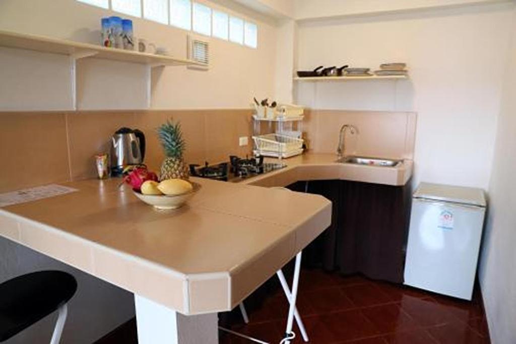 Kuchyň nebo kuchyňský kout v ubytování Swiss Villas Panoramic - SHA Certified