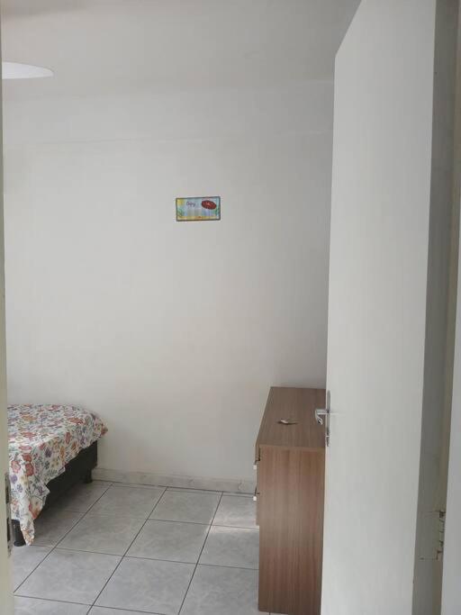 Postel nebo postele na pokoji v ubytování Quarto Privado Cama Casal ou Solteiros Apto