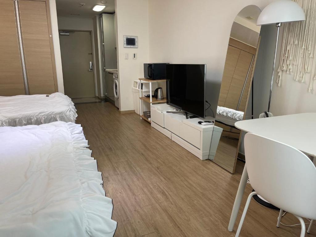 Gangnam House#good price#Luxury#Confort#Best location的电视和/或娱乐中心
