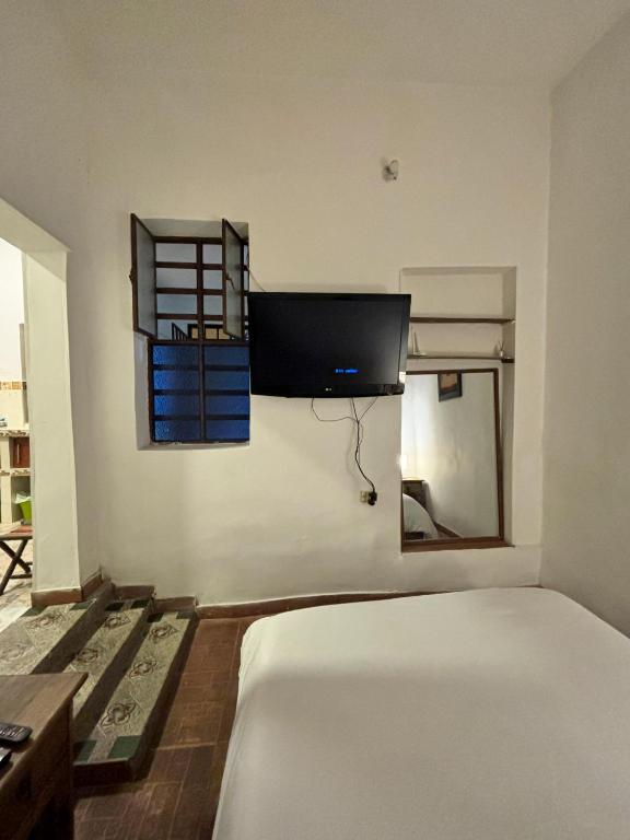 Postel nebo postele na pokoji v ubytování RC Apartments