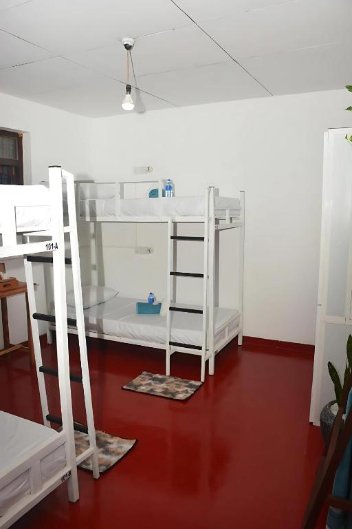 Postel nebo postele na pokoji v ubytování Memo's Inn