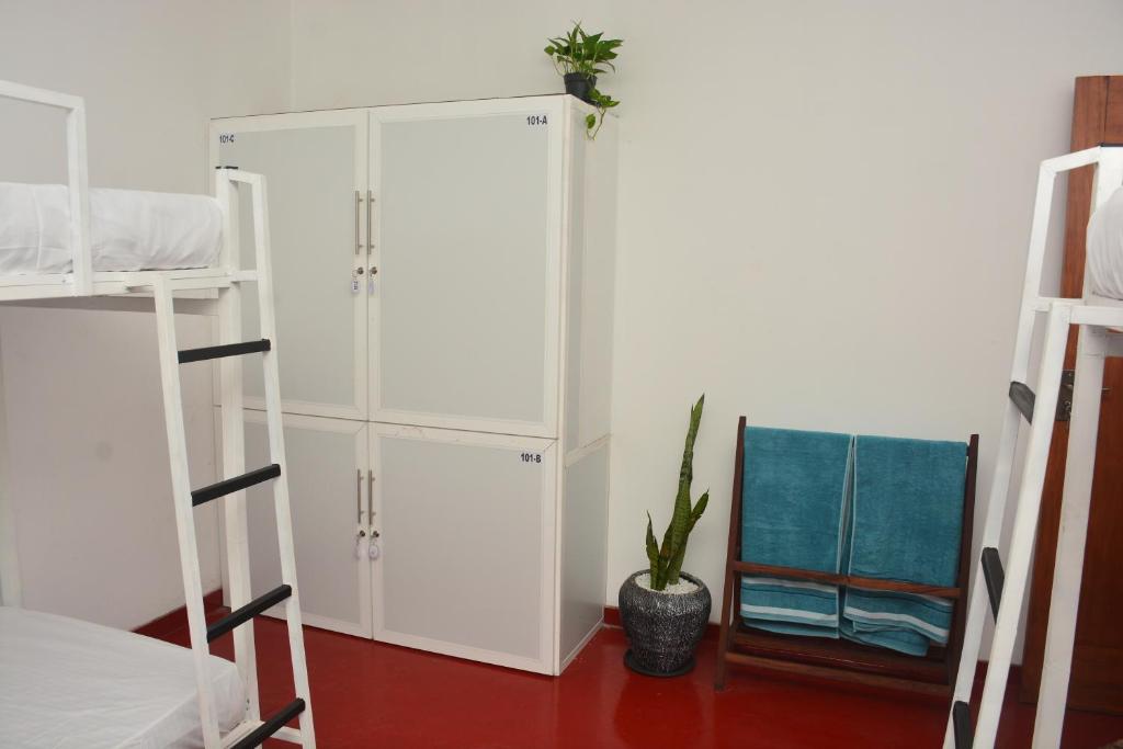 Postel nebo postele na pokoji v ubytování Memo's Inn