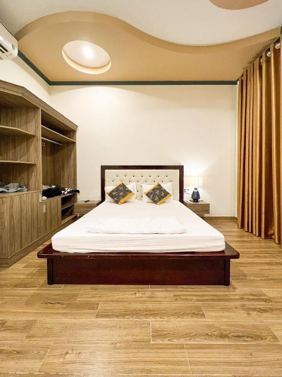 Giường trong phòng chung tại Gia An Hung Guest House
