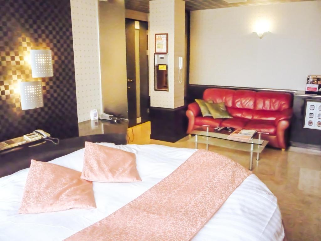 Postel nebo postele na pokoji v ubytování Hotel Coco de Annex (Love Hotel)
