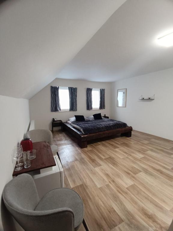 Postel nebo postele na pokoji v ubytování ApaHouse
