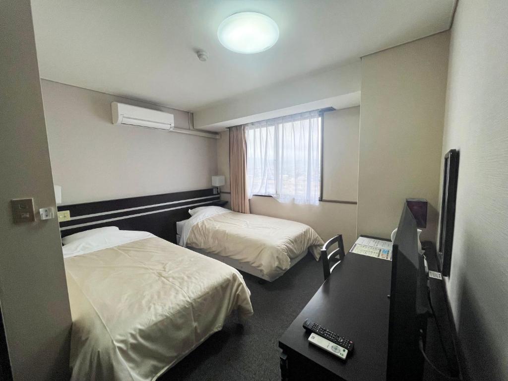 TV a/nebo společenská místnost v ubytování HOTEL CROWN HILLS FUJINOMIYA