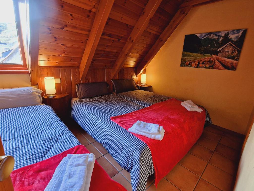 Posteľ alebo postele v izbe v ubytovaní MIRADORES de Apartamentos Rufaste