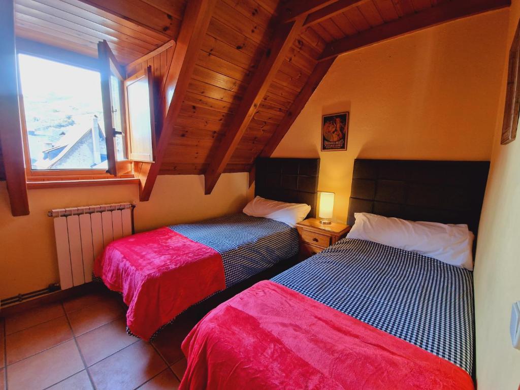 Posteľ alebo postele v izbe v ubytovaní MIRADORES de Apartamentos Rufaste