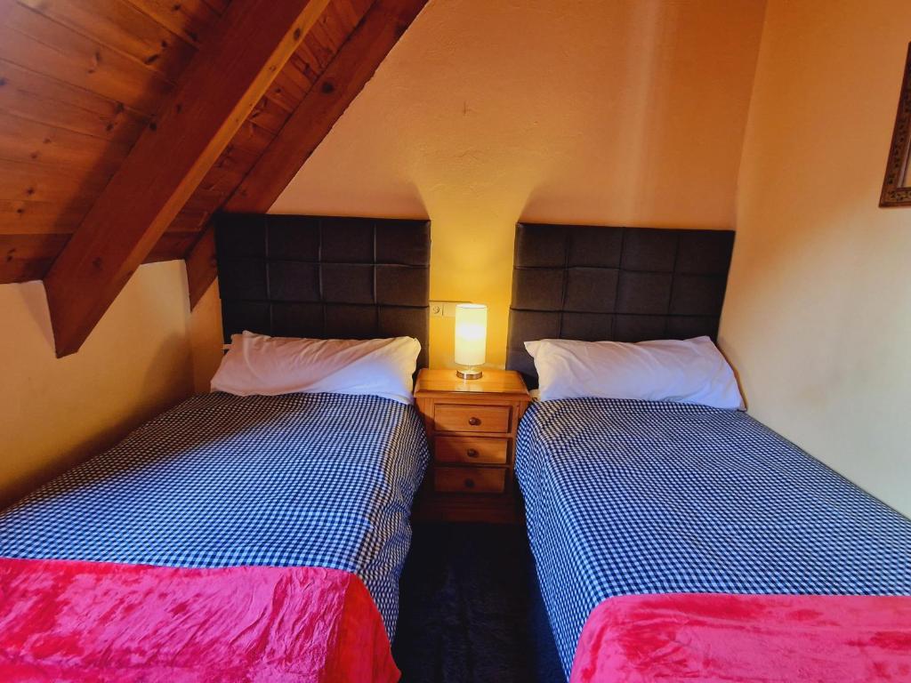 Posteľ alebo postele v izbe v ubytovaní MIRADORES de Apartamentos Rufaste