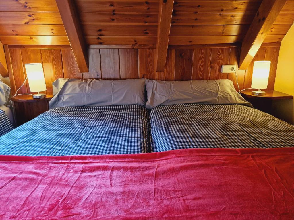 Posteľ alebo postele v izbe v ubytovaní MIRADORES de Apartamentos Rufaste