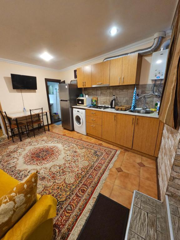 Kuchyň nebo kuchyňský kout v ubytování Buddha apartment