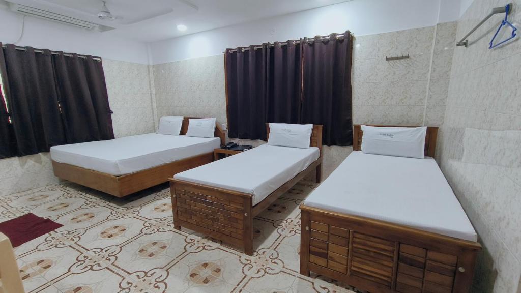Postel nebo postele na pokoji v ubytování Hotel Safra