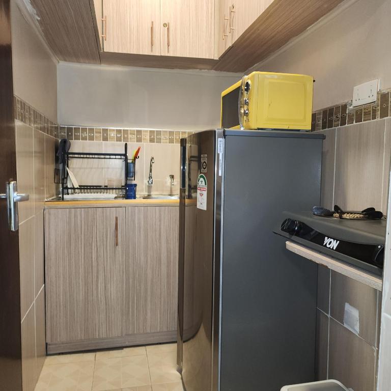 Kuchyň nebo kuchyňský kout v ubytování Cozy Stead