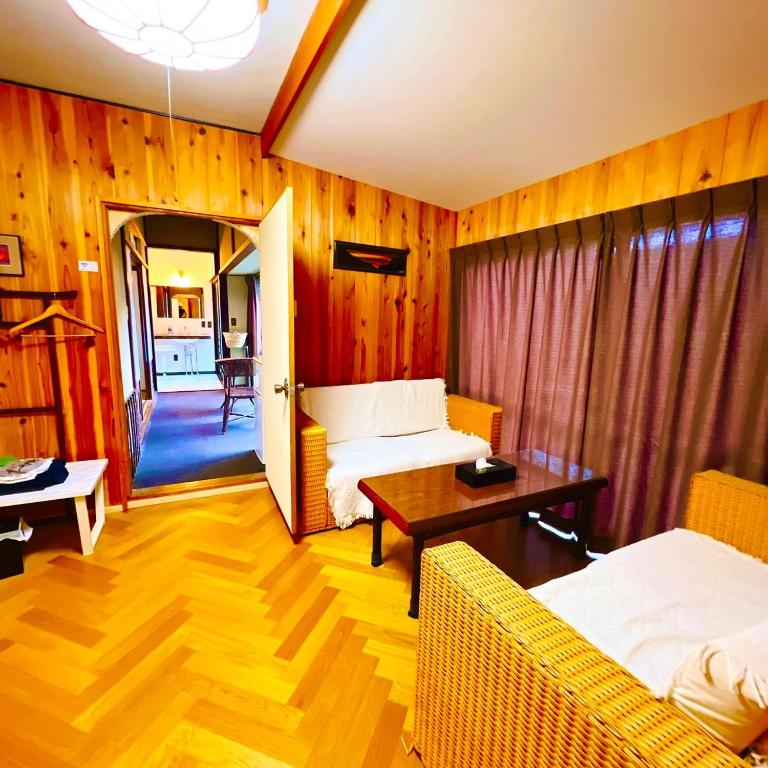 Postel nebo postele na pokoji v ubytování Japanese style hotel and dining Morigen