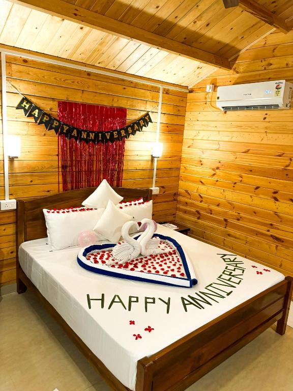 Postel nebo postele na pokoji v ubytování Red Crab Eco Resorts
