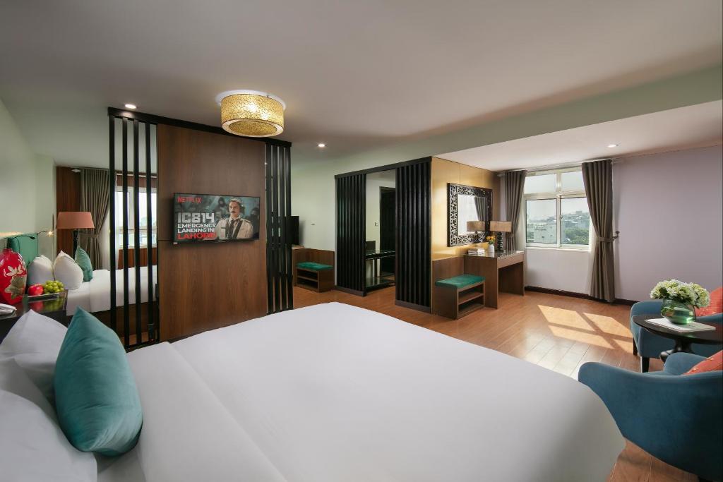 Postel nebo postele na pokoji v ubytování Anise Hotel & Spa Hanoi