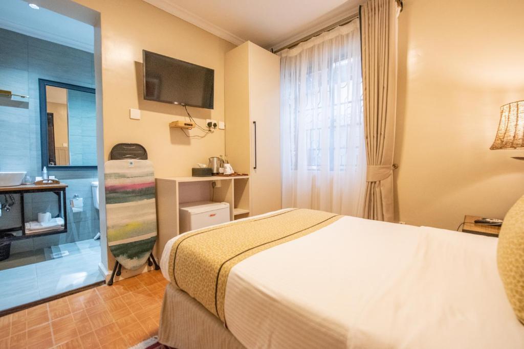 Postel nebo postele na pokoji v ubytování Cozy Stead