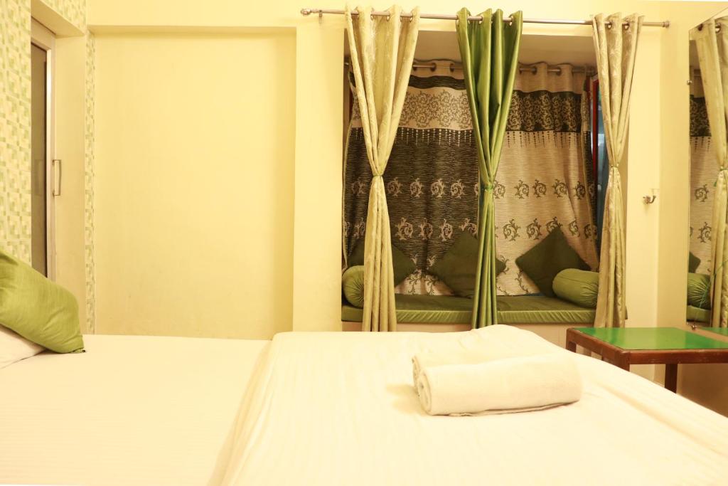 Letto o letti in una camera di Shiv Shakti Hostel