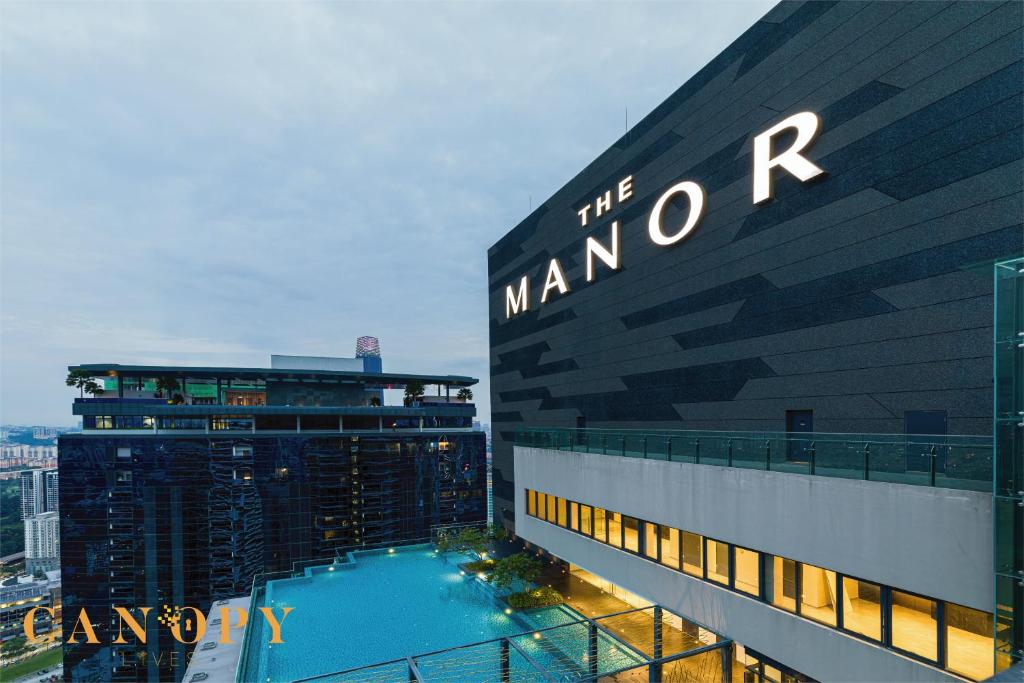 a view of the manor hotel with a large building at The Manor Signature Residence, Kuala Lumpur in Kuala Lumpur