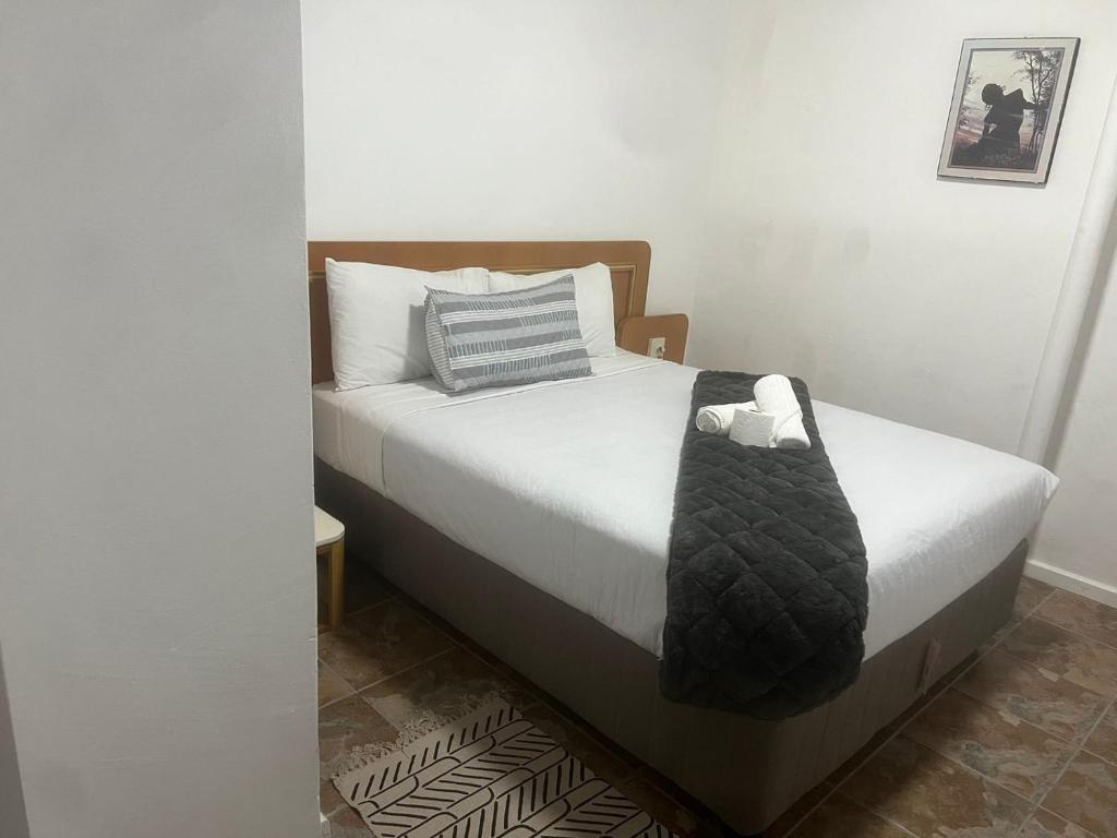 Letto o letti in una camera di Heba Guest Lodge Two