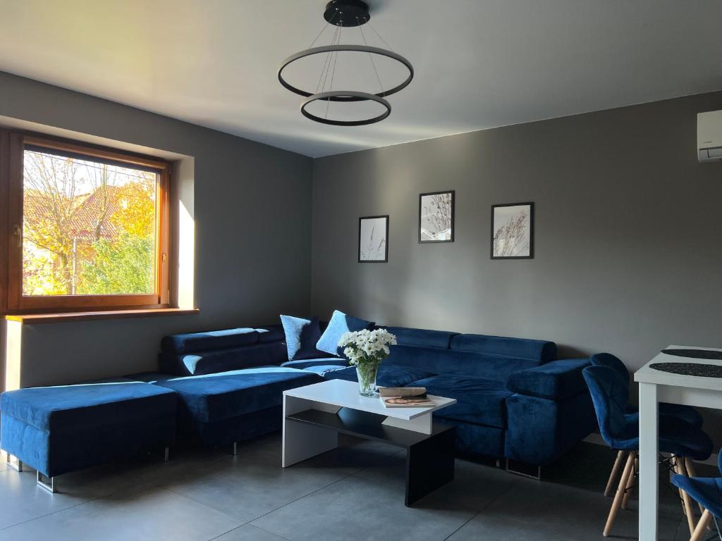 Posezení v ubytování Apartamenty River