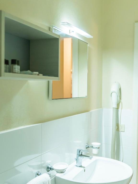 Koupelna v ubytování Hotel Fabricia