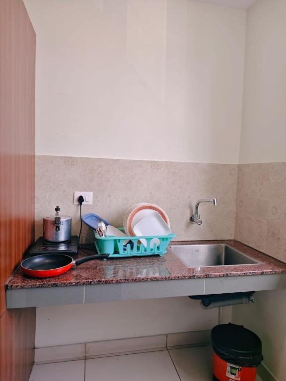 Kuchyň nebo kuchyňský kout v ubytování Nest Residency